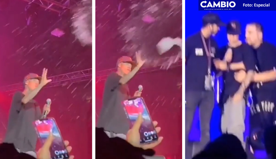 Fan lanza botella de tequila a Santa Fe Klan en pleno concierto y él ¡casi se le va a los golpes!