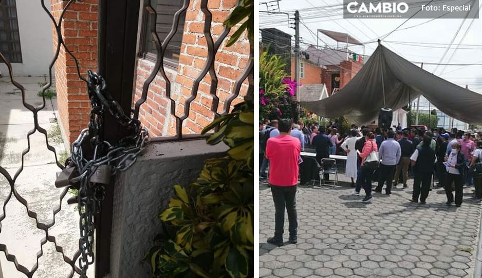 Cierran con candado oficinas del PAN en San Pedro Cholula; asamblea se realiza en la calle