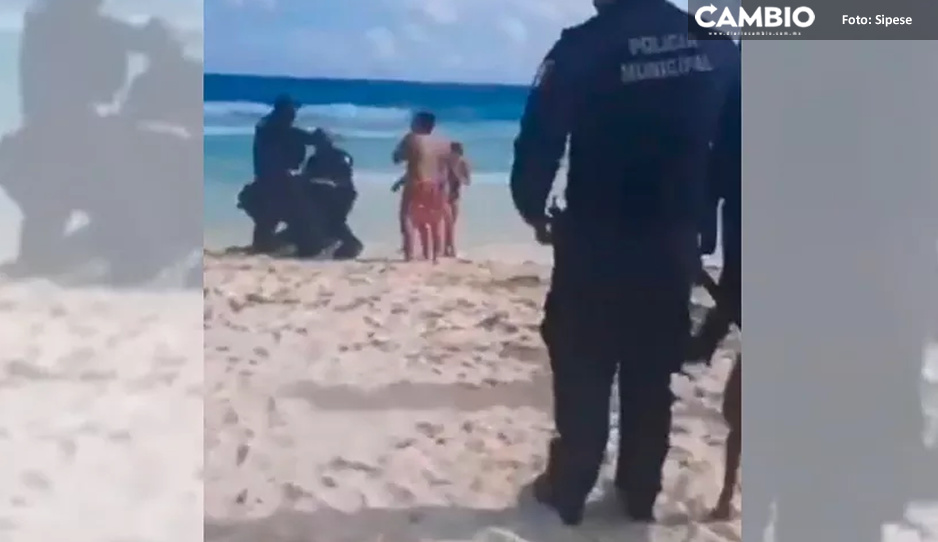 Policías de Cancún golpean y someten a ciudadano por pasear a su perrito en la playa (VIDEO)