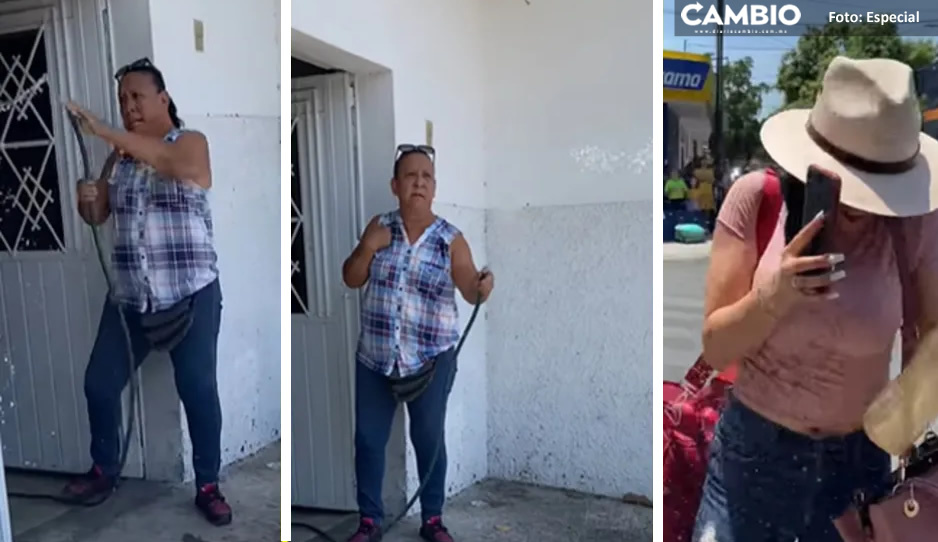 “La banqueta no es pública”:  Mujer moja a turistas que se cubren del sol afuera de su casa (VIDEO)