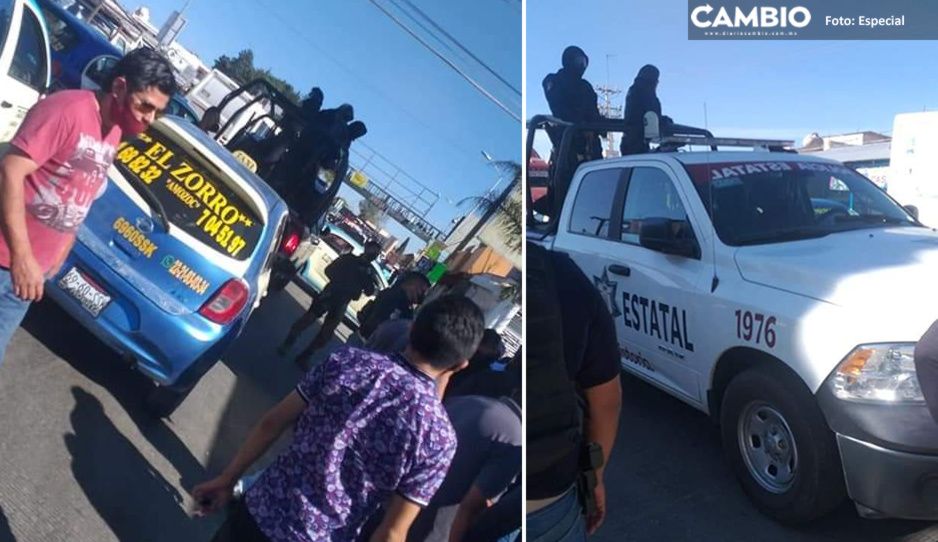 ¡Hay tiro! Policías estatales agreden a taxistas en la carretera Puebla- Amozoc