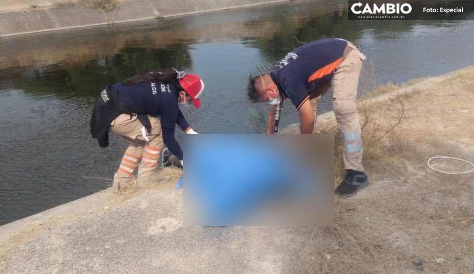 Hallan cadáver de mototaxista desaparecido flotando en canal de Tecamachalco (FOTOS)