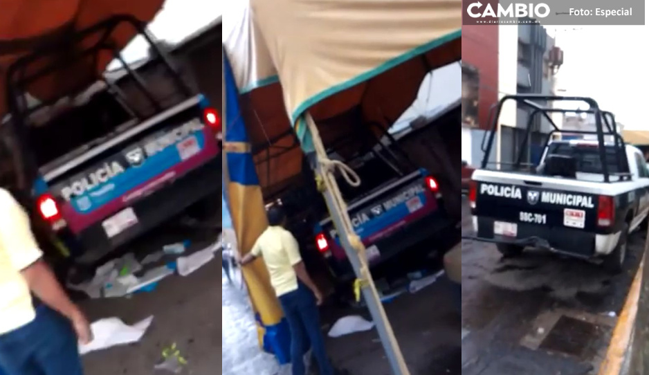 ¡¿Qué es eso!? Rotulan patrullas viejas como nuevas del Ayuntamiento en taller de San Baltazar y acaparan la calle (VIDEO)
