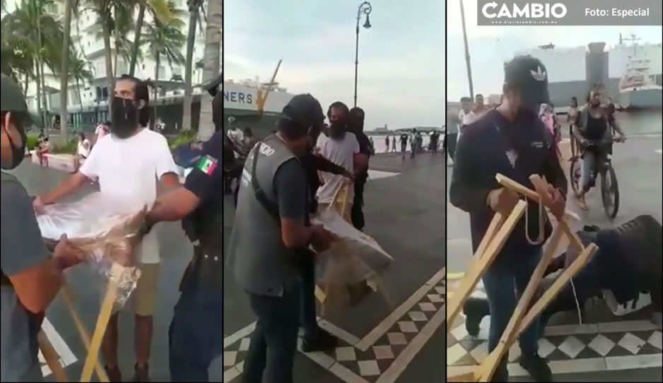 VIDEO: Policías humillan y arrebatan canasta de pan a ambulante en Veracruz
