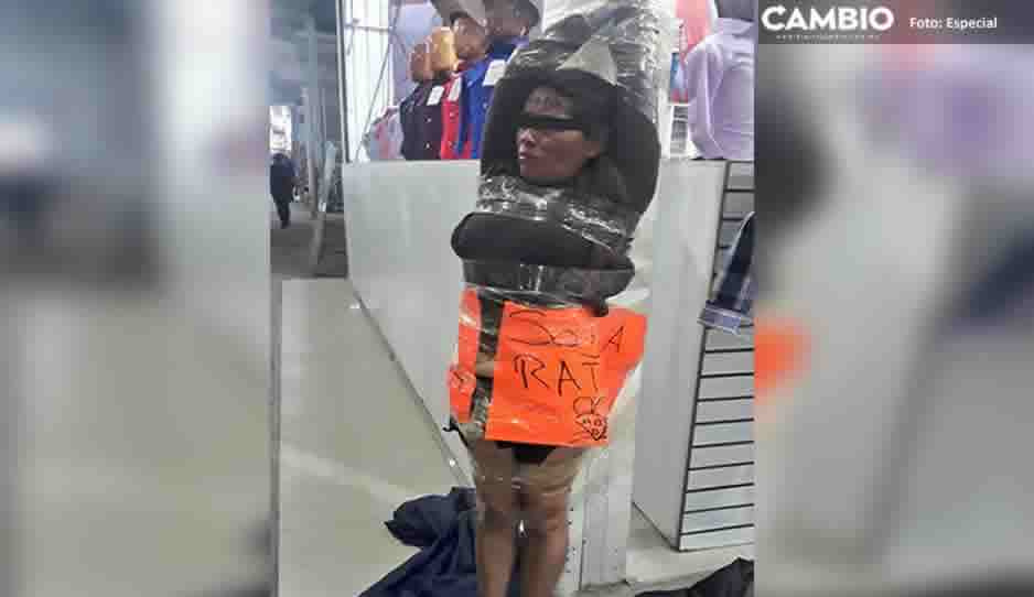 &quot;Soy rata&quot;, capturan y amarran a poste a presunta ladrona en tianguis de Texmelucan
