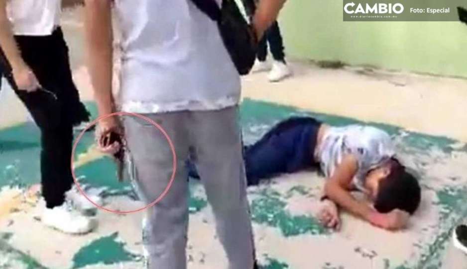 VIDEO FUERTE: Niño saca una pistola de su mochila durante riña