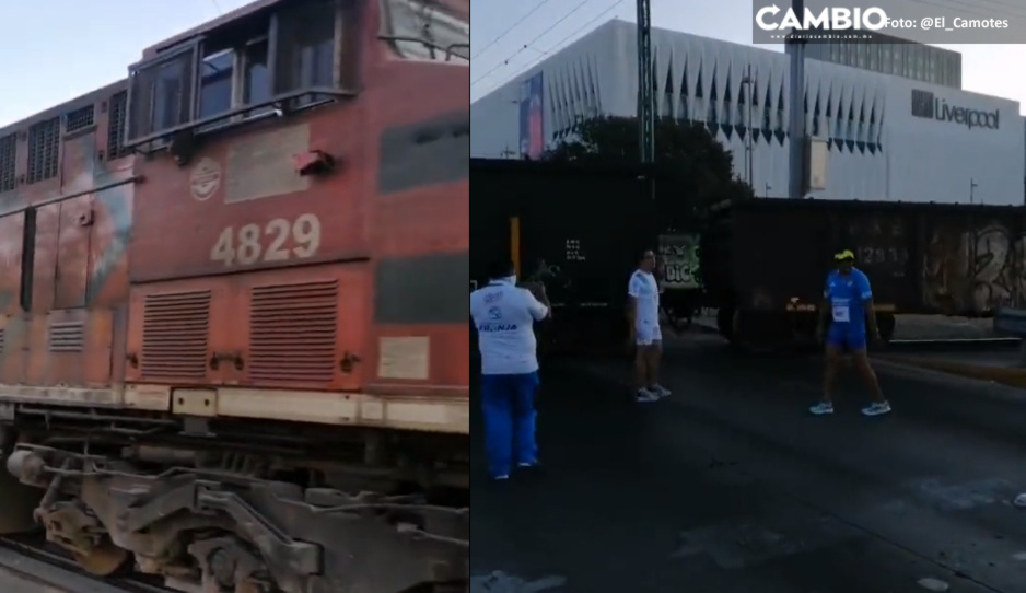 ¡Runners enfurecen! Tren se les cruza en plena carrera organizada por el Club Puebla (VIDEO)