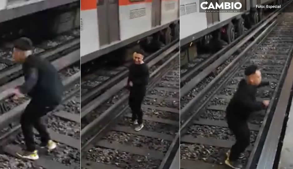¡INCREIBLE! Arriesga su vida bailando en las vías del metro (VIDEO)