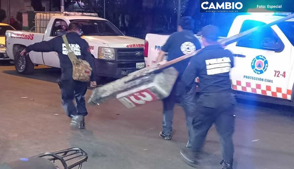 Caseta telefónica le cae a transeúnte en la cabeza en Atlixco; hay un lesionado