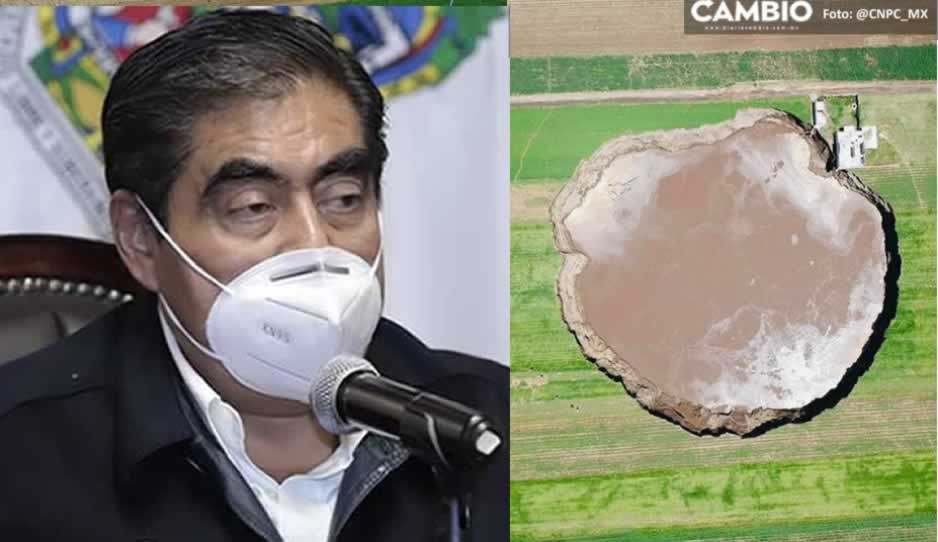 Gobierno de Puebla pagará a familia afectada por socavón el terreno que quieran