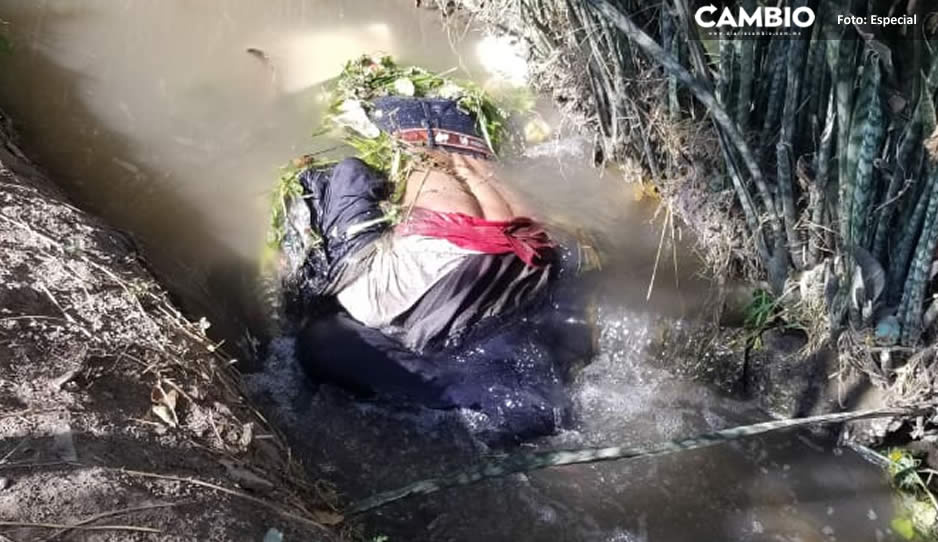 Hallan el cuerpo de un hombre flotando en acequia de Atlixco