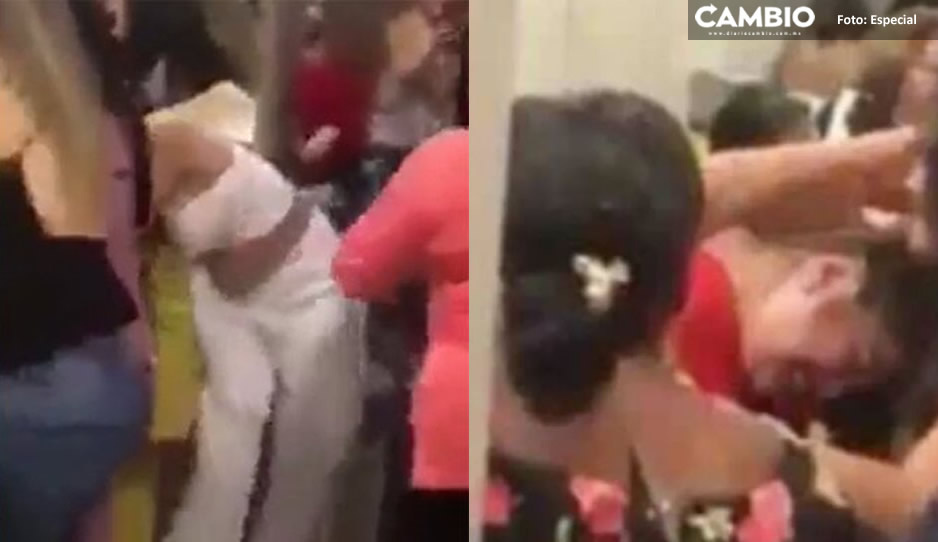 Exponiendo infieles: Jefe regala lencería a empleada en intercambio navideño y esposa se le va a golpes (VIDEO)