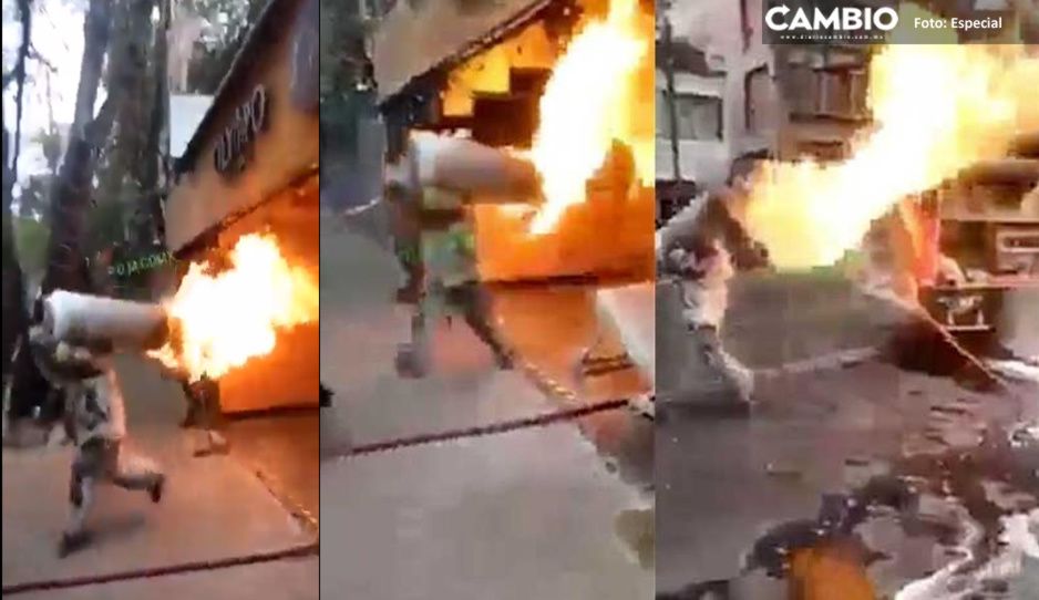 No es el hombre en llamas, es un bombero cargando un tanque a punto de explotar (VIDEO)