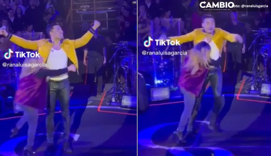¡Se pasó de emocionada! Fan taclea a Carlos Rivera durante concierto (VIDEO)