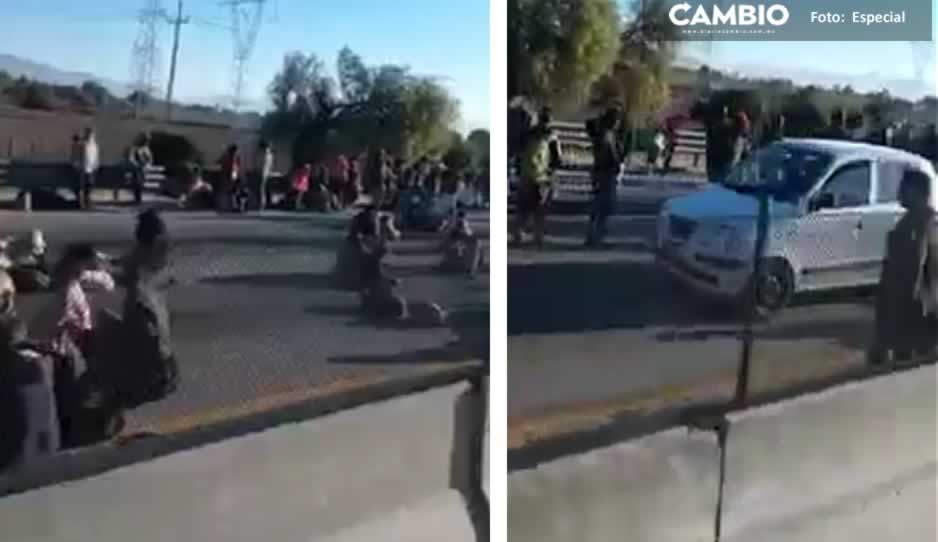 ¡Migrantes invaden Puebla! Atascan la autopista en la Puebla-Veracruz (VIDEO)