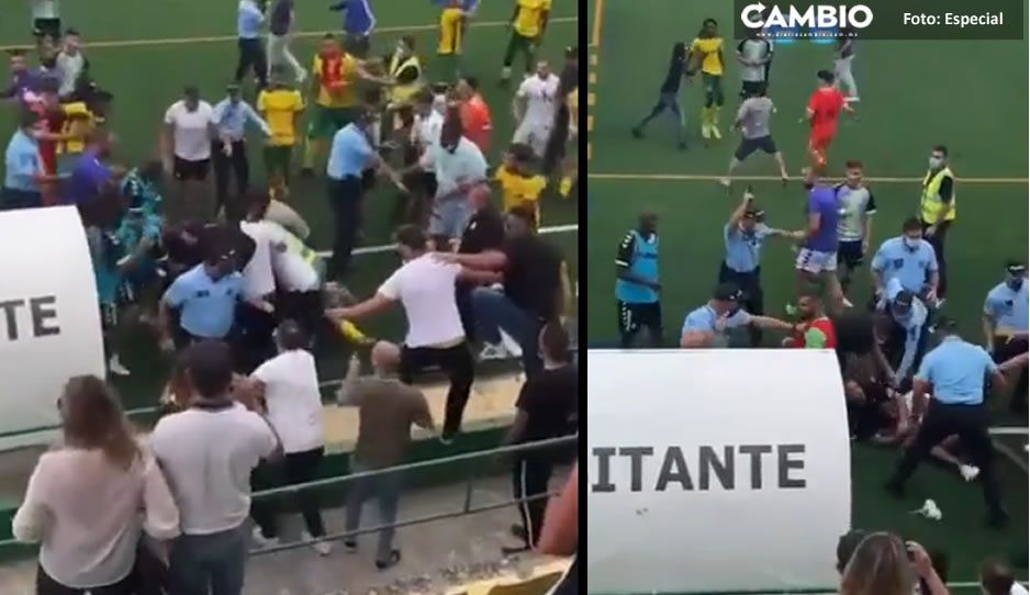 FUERTE VIDEO: Policía detiene a balazos batalla campal durante partido de futbol