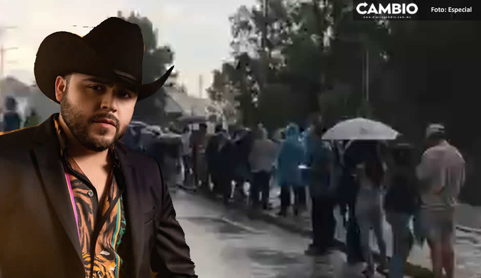 VIDEO: intensa lluvia en la Feria de Puebla y fans siguen formados para ver a Gerardo Ortiz