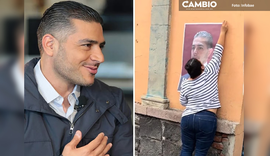 ¡Todo un rompecorazones! Captan a mujer robando y besando cartel de Omar García Harfuch (VIDEO)