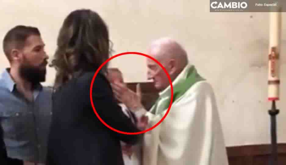 ¡Experiencia religiosa! Reviven VIDEO de sacerdote cacheteando a bebé que llora durante su bautizo