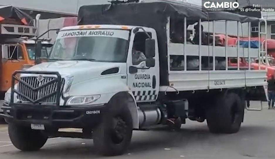 ¡En una camioneta negra y sin placas! Así se llevaron al elemento de la GN golpeado en la Central de Abasto