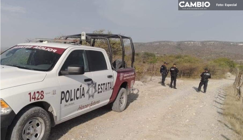 Hallan cadáver con signos de violencia en brecha de terracería en Coatzingo
