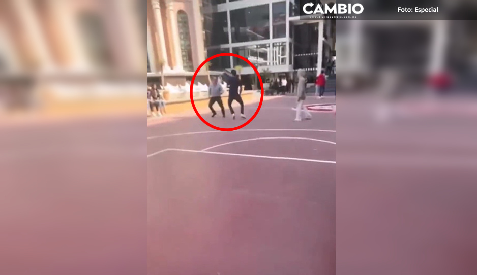 ¡Hay tiro! Papá se agarra a golpes con estudiante tras agredir a su hija (VIDEO)