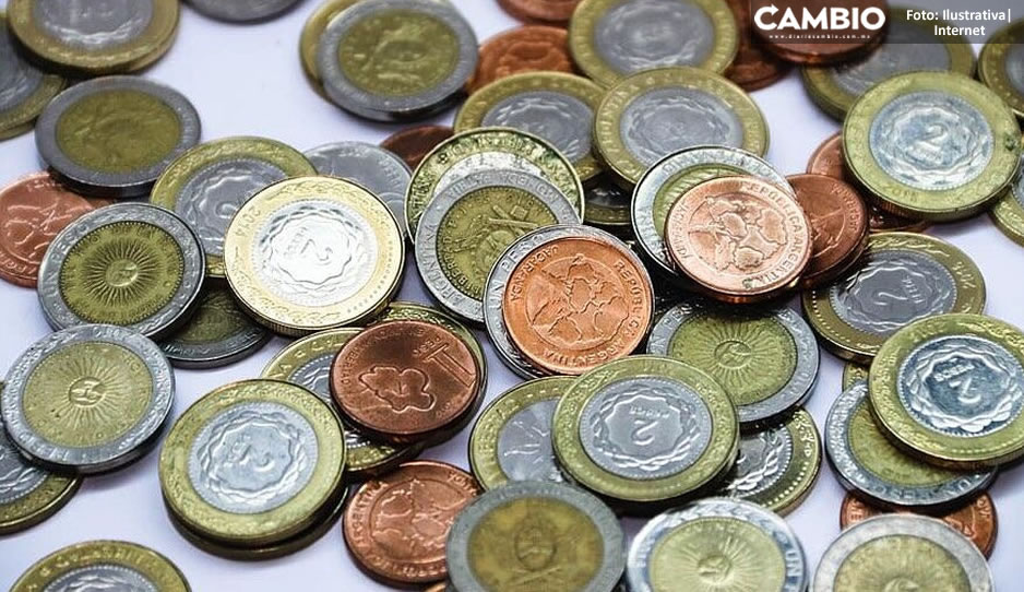 Devalúan la moneda argentina a 800 pesos por dólar para evitar la hiperinflación