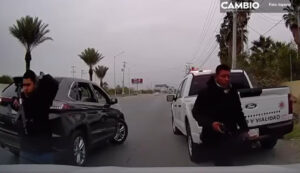 VIDEO: ¡Se hizo pato! Familia escapa de intento de asalto justo frente a oficial de tránsito
